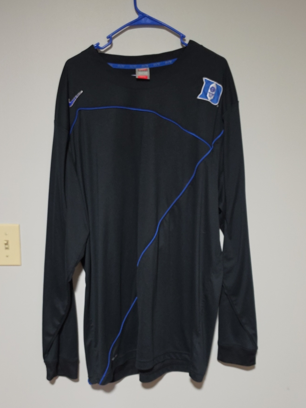 Nike Men’s Black Long Sleeve Performance Shirt with Blue Piping